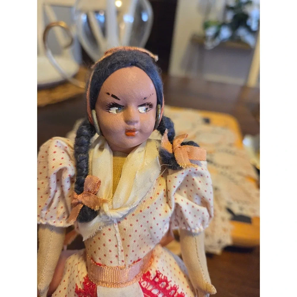 vintage Argentine gaucho folk art doll featuring a hand-painted face
